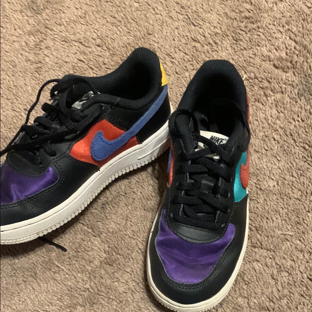 Bold Multicolor Low-Top Sneakers with Teal Swoosh